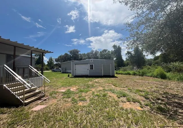 Photo 3 of Manufactured home for sale at 15299 Ne 238th Street, Fort Mc Coy, FL 32134 | MLS# OM728665 | Listing updated on 2026-08-14