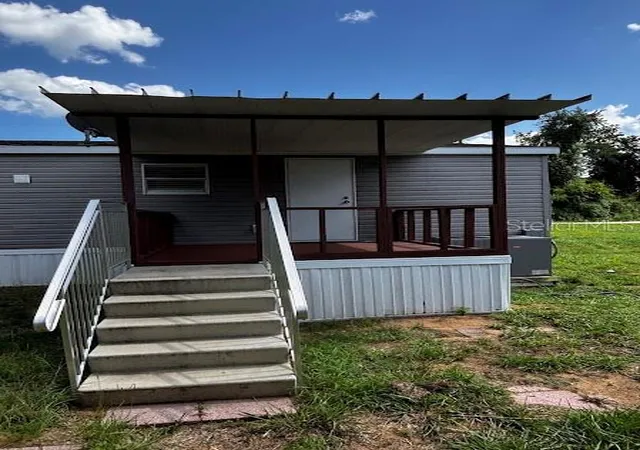 Photo 4 of Manufactured home for sale at 15299 NE 238th Street, Fort Mc Coy, FL 32134 | MLS# OM728665 | Listing updated on 2026-08-14