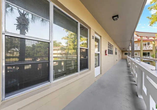 Photo 2 of Condo for sale at 2416 World Pkwy Blvd #26, Clearwater, FL 33763 | MLS# TB8530121 | Listing updated on 2026-08-24
