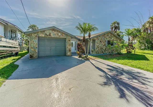 Photo 1 of Single family home for sale at 5254 Miller Bayou Dr, Port Richey, FL 34668 | MLS# TB8530139 | Listing updated on 2026-08-31