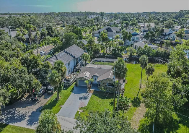 Photo 2 of Single family home for sale at 5254 Miller Bayou Dr, Port Richey, FL 34668 | MLS# TB8530139 | Listing updated on 2026-08-31
