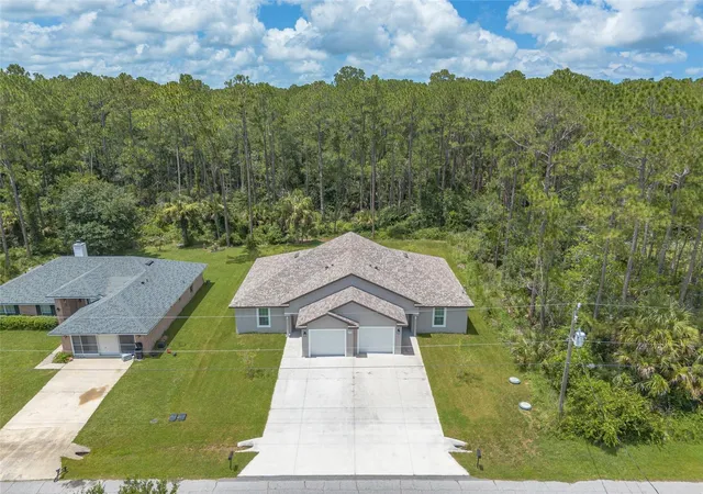 Multi family home for sale at 48 Regency Dr, PALM COAST, FL 32164 | MLS# V4950271