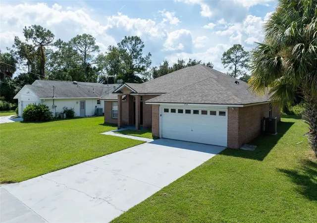 Photo 3 of Single family home for sale at 156 Barrington Dr, Palm Coast, FL 32137 | MLS# FC320033 | Listing updated on 2026-10-01