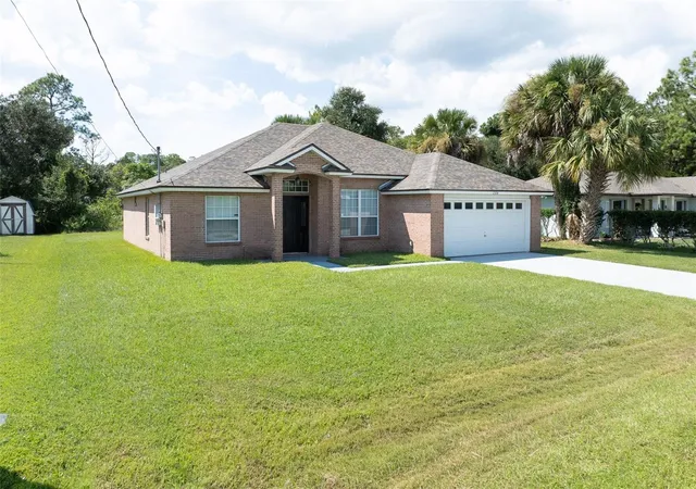 Photo 3 of Single family home for sale at 156 Barrington Dr, Palm Coast, FL 32137 | MLS# FC320033 | Listing updated on 2026-10-01