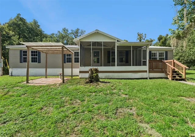 Photo 1 of Manufactured home for sale at 129 Patrician Pl, Satsuma, FL 32189 | MLS# O6426049 | Listing updated on 2026-08-14