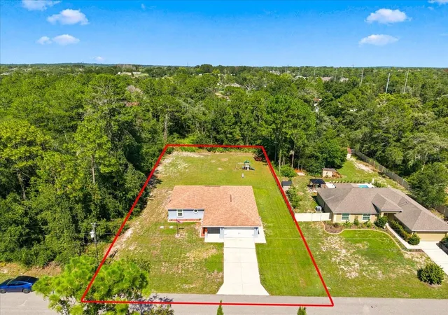 Photo 3 of Single family home for sale at 12327 Millington Ave, Weeki Wachee, FL 34614 | MLS# TB8530284 | Listing updated on 2026-09-23
