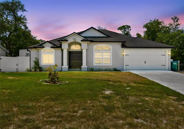 Photo 1 of Single family home for sale at 1965 Alameda Dr, Deltona, FL 32738 | MLS# O6426081 | Listing updated on 2026-08-22