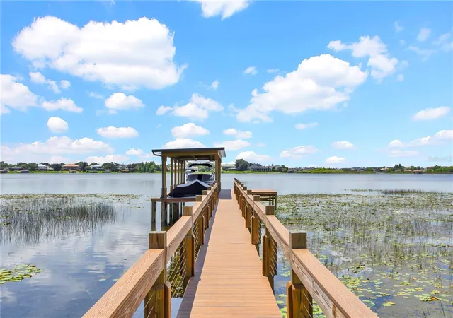 Photo 3 of Single family home for sale at 7720 Ficquette Rd, Windermere, FL 34786 | MLS# O6426088 | Listing updated on 2026-09-23