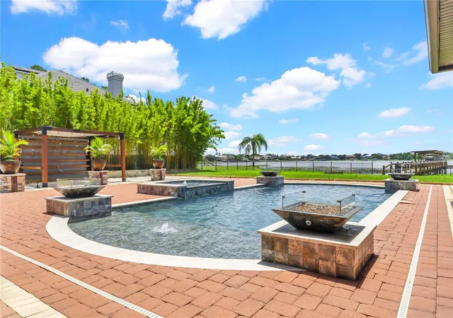 Photo 4 of Single family home for sale at 7720 Ficquette Rd, Windermere, FL 34786 | MLS# O6426088 | Listing updated on 2026-09-23