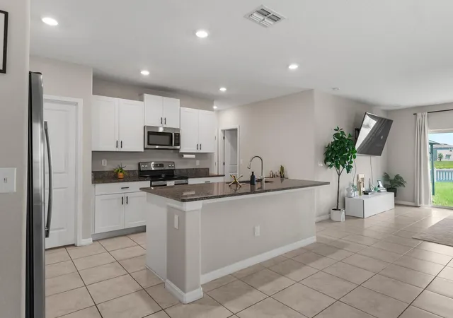 Photo 4 of Single family home for sale at 31575 Barrel Wave Way, Wesley Chapel, FL 33545 | MLS# TB8530304 | Listing updated on 2026-08-29