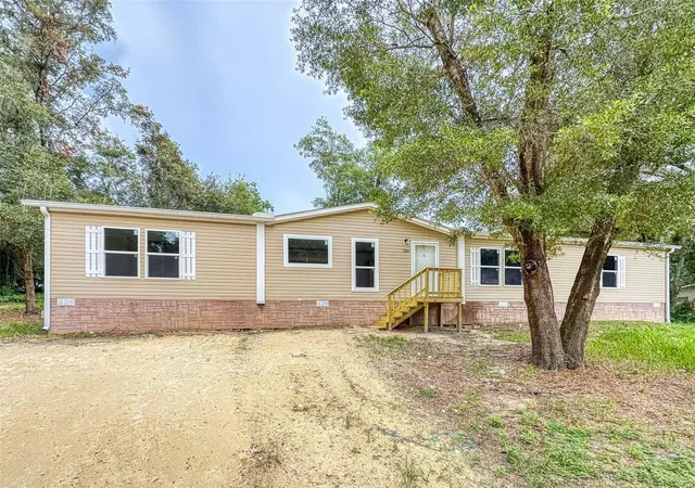 Photo 1 of Manufactured home for sale at 12841 SE 103rd Terrace, Belleview, FL 34420 | MLS# A4700333 | Listing updated on 2026-09-17
