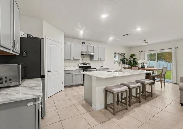 Photo 4 of Single family home for sale at 210 Meadowbrook Blvd, Winter Haven, FL 33881 | MLS# TB8530332 | Listing updated on 2026-07-26