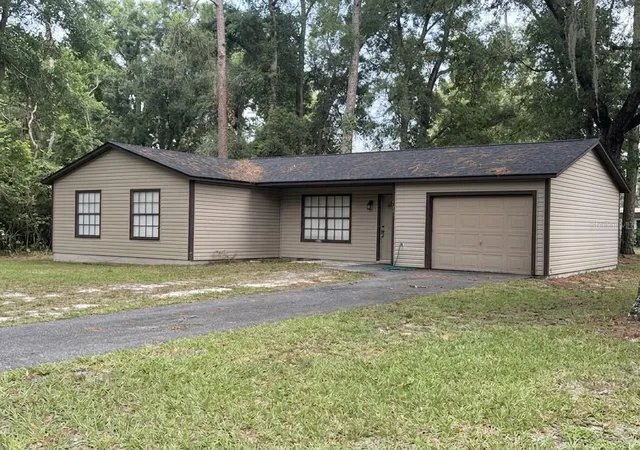 Photo 1 of Single family home for sale at 2404 Ne 32nd Place, Ocala, FL 34479 | MLS# OM728728 | Listing updated on 2026-09-08