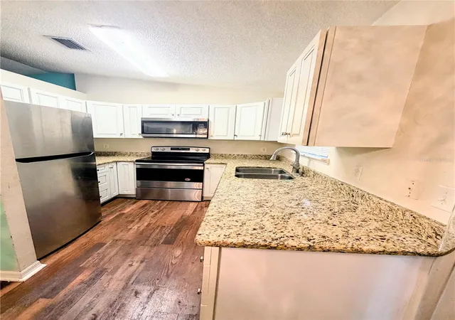 Photo 3 of Single family home for sale at 2404 NE 32nd Place, Ocala, FL 34479 | MLS# OM728728 | Listing updated on 2026-09-08