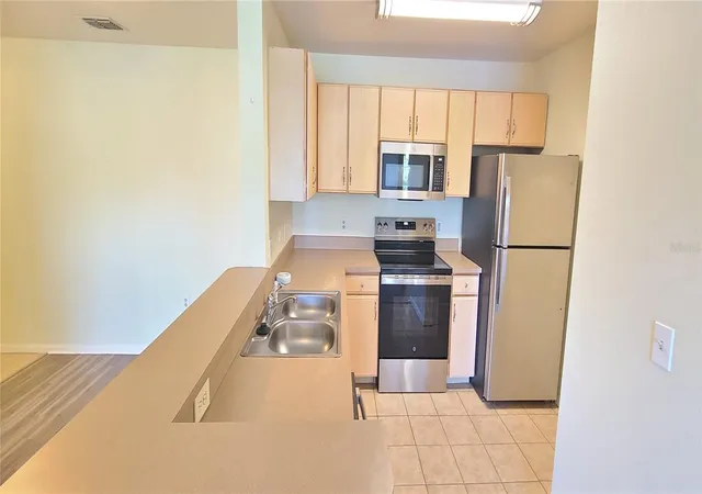 Photo 4 of Condo for sale at 940 Village Trl #4-202, Port Orange, FL 32127 | MLS# O6426250 | Listing updated on 2026-08-25