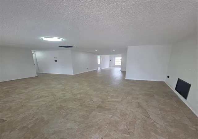 Photo 3 of Single family home for sale at 8948 Saint Regis Ln, Port Richey, FL 34668 | MLS# TB8530501 | Listing updated on 2026-09-17