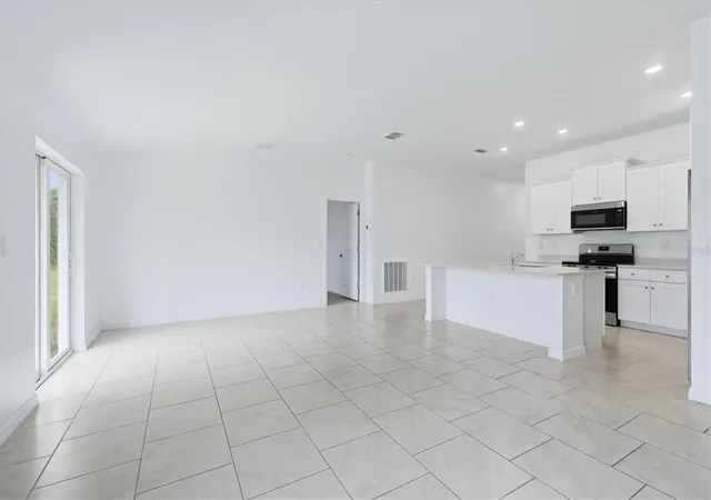 Photo 3 of Single family home for sale at 1403 Aken St, Port Charlotte, FL 33952 | MLS# N6145063 | Listing updated on 2026-10-15