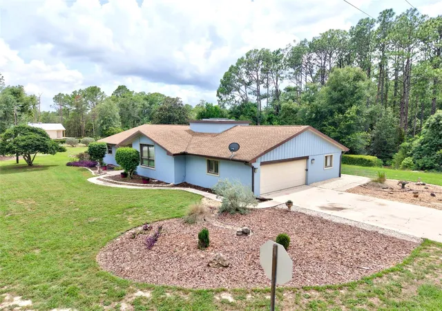 1st image of 10848 N Dragonis Dr, Citrus Springs, FL 34433 | MLS# O6426319