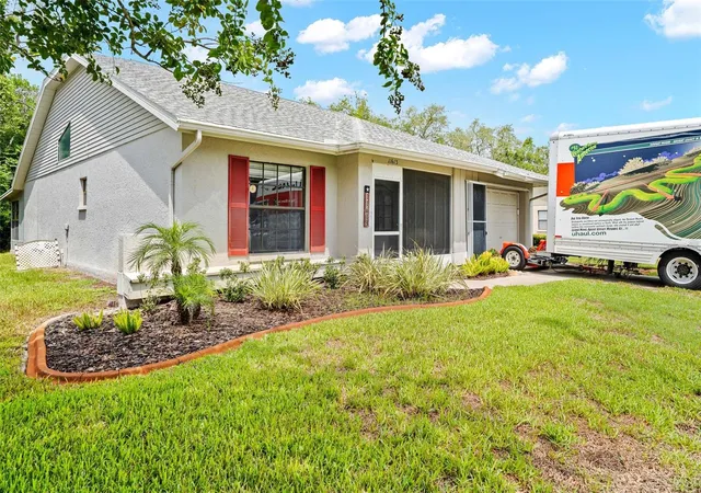 Photo 2 of Single family home for sale at 11613 Pear Tree Dr, New Port Richey, FL 34654 | MLS# W7887786 | Listing updated on 2026-10-01