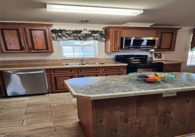 Photo 3 of Single family home for sale at 1722 Evergreen St, Kissimmee, FL 34746 | MLS# O6426368 | Listing updated on 2026-09-06