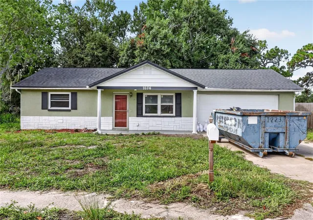 Photo 1 of Single family home for sale at 7036 Ashwood Dr, Port Richey, FL 34668 | MLS# O6426408 | Listing updated on 2026-09-28