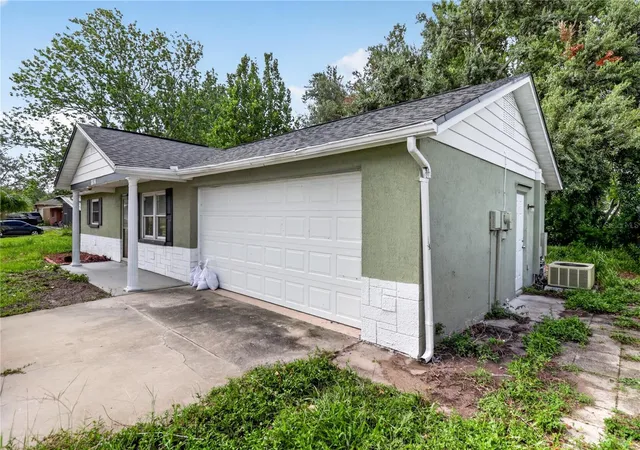 Photo 2 of Single family home for sale at 7036 Ashwood Dr, Port Richey, FL 34668 | MLS# O6426408 | Listing updated on 2026-09-28