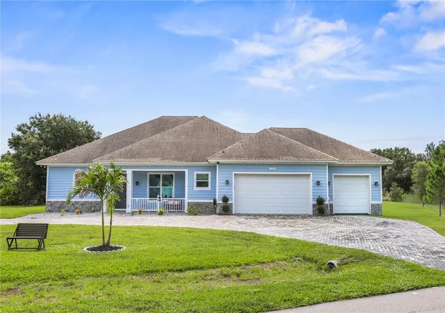 Photo 1 of Single family home for sale at 306 Calendar St, Port Charlotte, FL 33954 | MLS# A4700475 | Listing updated on 2026-09-12