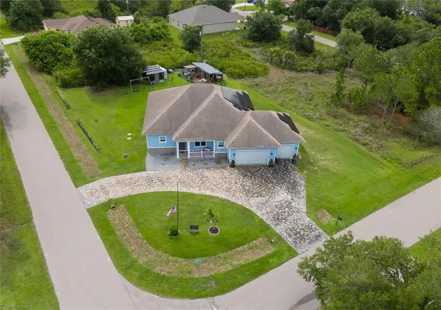 Photo 38 of Single family home for sale at 306 Calendar St, Port Charlotte, FL 33954 | MLS# A4700475 | Listing updated on 2026-09-12
