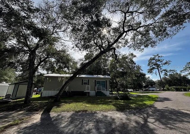 Photo 2 of Manufactured home for sale at 25296 141st Street Ne #380, Fort Mc Coy, FL 32134 | MLS# OM728790 | Listing updated on 2026-07-31