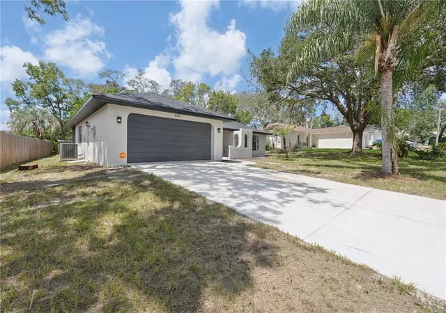 Photo 2 of Single family home for sale at 8081 Wooden Dr, Spring Hill, FL 34606 | MLS# TB8530770 | Listing updated on 2026-09-02
