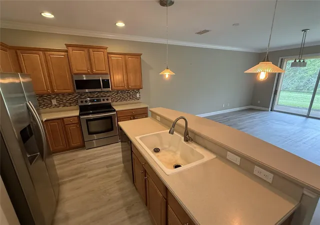 Photo 3 of Townhouse for sale at 11550 52nd Court E, Parrish, FL 34219 | MLS# TB8530808 | Listing updated on 2026-08-25