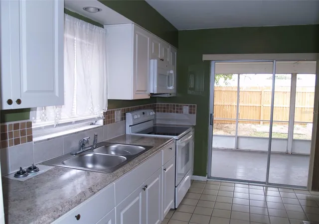 Listing Photo 5 - Condo for sale in building located at 21306 Stillwater Ave, PORT CHARLOTTE, FL 33952