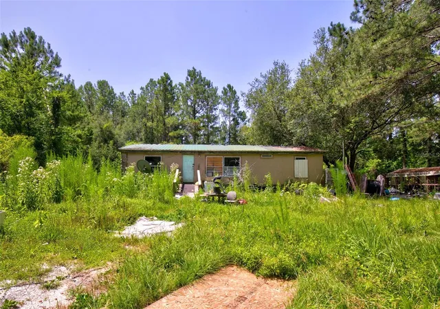 Photo 3 of Manufactured home for sale at 7320 Ne 137th Place, Citra, FL 32113 | MLS# OM728813 | Listing updated on 2026-07-29