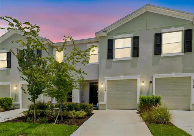Photo 1 of Townhouse for sale at 17245 Amber Aspen Way, Land O Lakes, FL 34638 | MLS# A4700506 | Listing updated on 2026-10-11