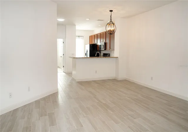 Photo 3 of Townhouse for sale at 8481 Leeland Archer Blvd, Orlando, FL 32836 | MLS# O6426544 | Listing updated on 2026-08-31