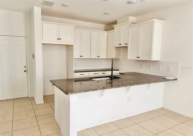 Photo 2 of Townhouse for sale at 9987 Randal Walk St, Orlando, FL 32832 | MLS# O6426551 | Listing updated on 2026-09-15