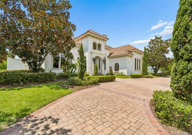 Photo 2 of Single family home for sale at 13250 Bellaria Cir, Windermere, FL 34786 | MLS# W7887812 | Listing updated on 2026-07-31