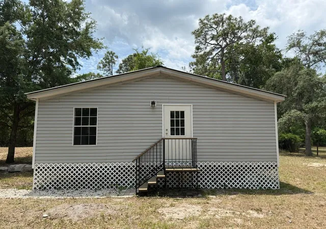 Photo 4 of Manufactured home for sale at 10405 Jungle St, New Port Richey, FL 34654 | MLS# TB8530881 | Listing updated on 2026-08-26