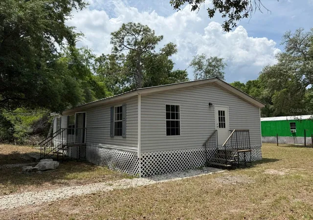 Photo 5 of Manufactured home for sale at 10405 Jungle St, New Port Richey, FL 34654 | MLS# TB8530881 | Listing updated on 2026-08-26