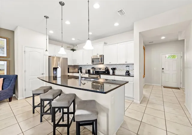 Photo 4 of Townhouse for sale at 2070 Rome Dr, Kissimmee, FL 34747 | MLS# O6426610 | Listing updated on 2026-08-27