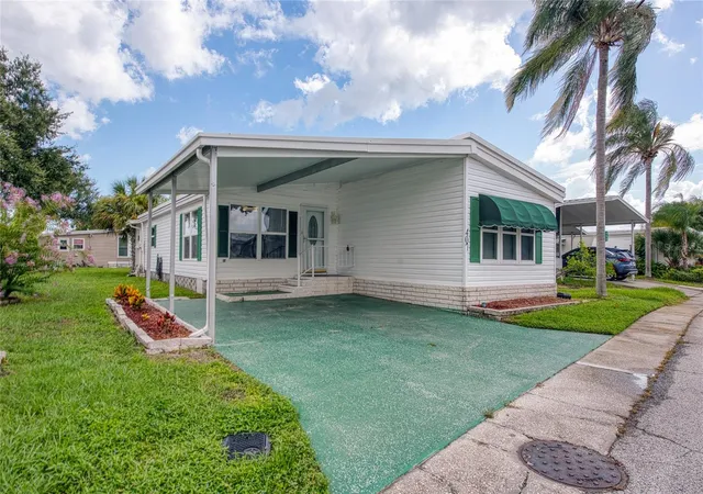 Photo 1 of Manufactured home for sale at 407 Dolphin Dr S, Oldsmar, FL 34677 | MLS# TB8530978 | Listing updated on 2026-09-28