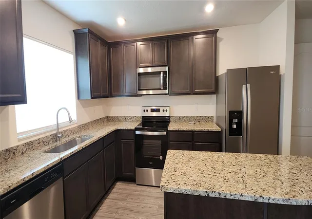 Photo 4 of Townhouse for sale at 1531 Wynford Cir, Tavares, FL 32778 | MLS# O6426684 | Listing updated on 2026-10-05