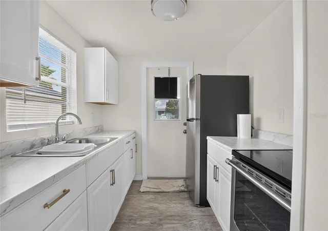 Photo 2 of Single family home for sale at 4706 S 87th Street, Tampa, FL 33619 | MLS# O6426725 | Listing updated on 2026-09-05