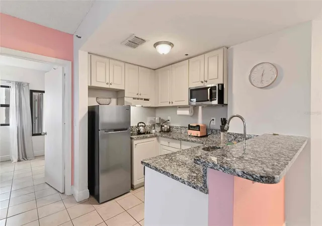 Photo 3 of Condo for sale at 6165 Carrier Dr #1402, Orlando, FL 32819 | MLS# O6426774 | Listing updated on 2026-09-03