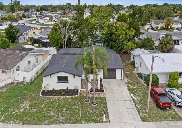 Photo 2 of Single family home for sale at 9401 Glen Moor Ln, Port Richey, FL 34668 | MLS# TB8531105 | Listing updated on 2026-08-05