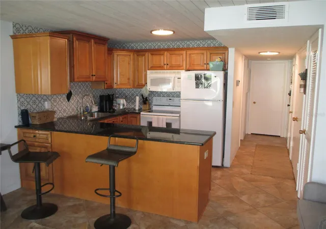 Photo 3 of Condo for sale at 1441 N Atlantic Ave #113, Daytona Beach, FL 32118 | MLS# O6426801 | Listing updated on 2026-07-21