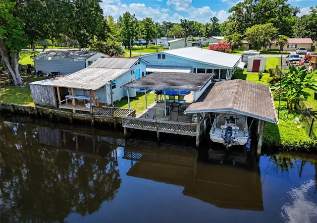 Photo 1 of Manufactured home for sale at 104 Edgewater Rd, Satsuma, FL 32189 | MLS# OM728882 | Listing updated on 2026-08-29