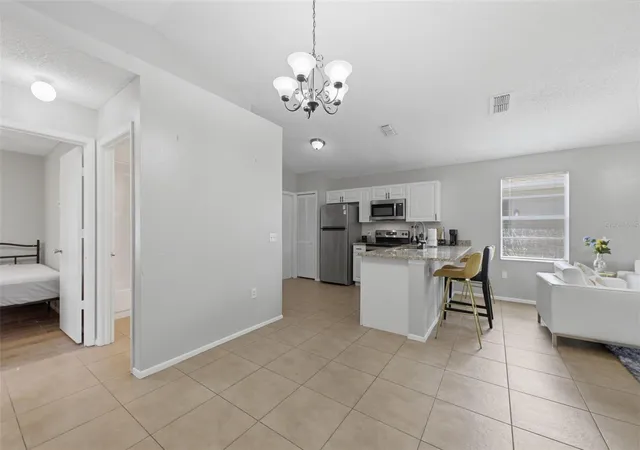 Photo 3 of Single family home for sale at 5230 Florida Holly Dr, Orlando, FL 32811 | MLS# O6426827 | Listing updated on 2026-09-01
