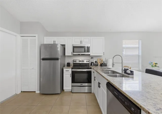 Photo 4 of Single family home for sale at 5230 Florida Holly Dr, Orlando, FL 32811 | MLS# O6426827 | Listing updated on 2026-09-01