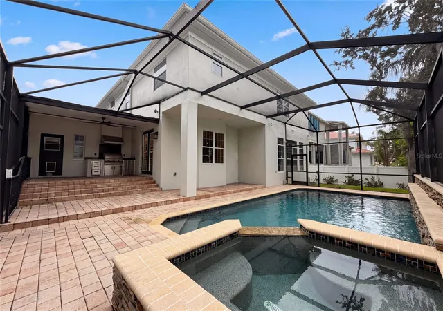Photo 4 of Single family home for sale at 5105 W Neptune Way, Tampa, FL 33609 | MLS# O6426838 | Listing updated on 2026-10-09